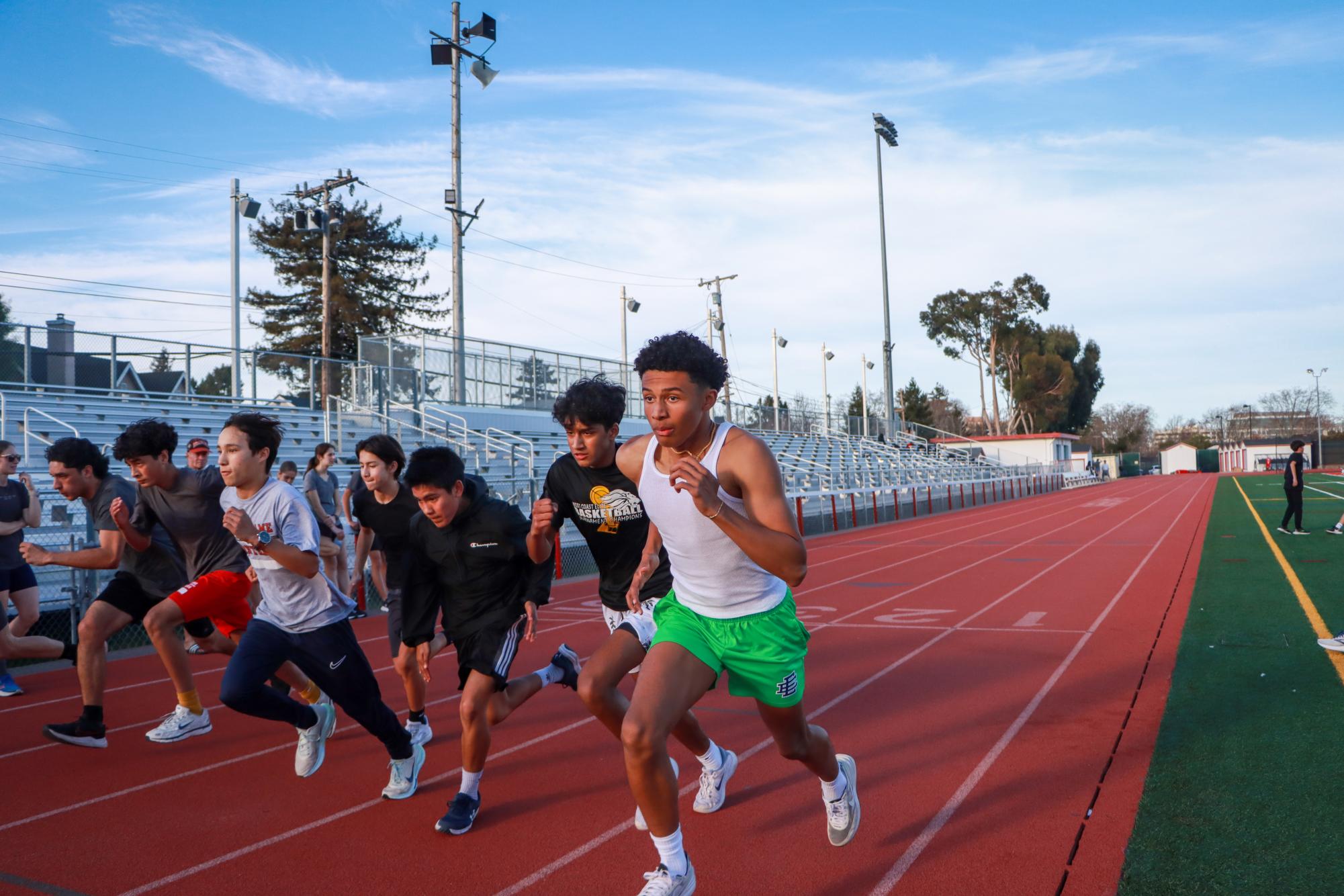 Track athletes run the 400-meter during their timed trial practice on Thursday, Feb. 27. 