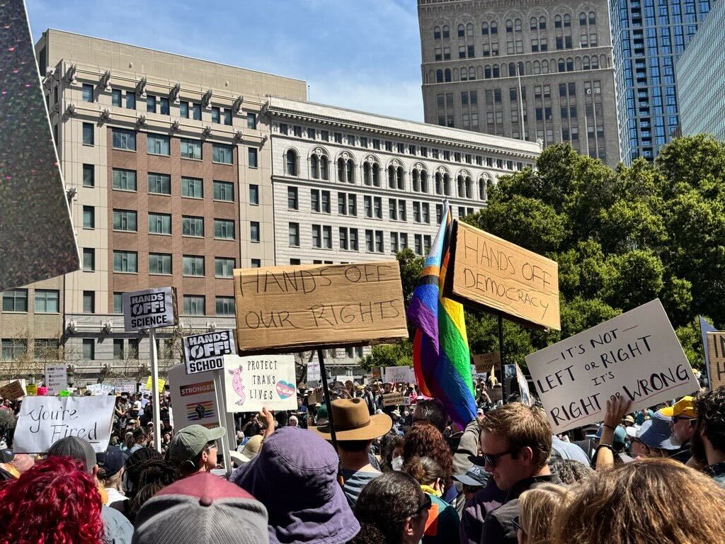 Demonstrators assemble in Oakland on April 5 as part of the ‘Hands Off Our Government’ movement protesting Trump and Musk’s recent actions.
