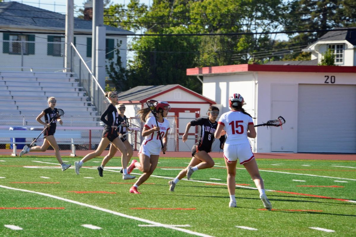 Senior defender Ella Wang pushes up the field during the first quarter of a game against Los Gatos on Tuesday, May 13.