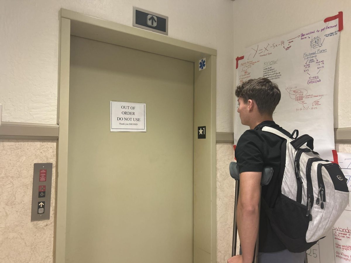 The elevator in the C-Building is one of the several out-of-service elevators on campus, complicating mobility for junior Adam Zimmer, who broke his ankle and now relies on crutches.