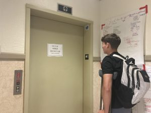 The elevator in the C-Building is one of the several out-of-service elevators on campus, complicating mobility for junior Adam Zimmer, who broke his ankle and now relies on crutches.