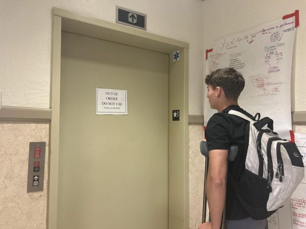 The elevator in the C-Building is one of the several out-of-service elevators on campus, complicating mobility for junior Adam Zimmer, who broke his ankle and now relies on crutches.