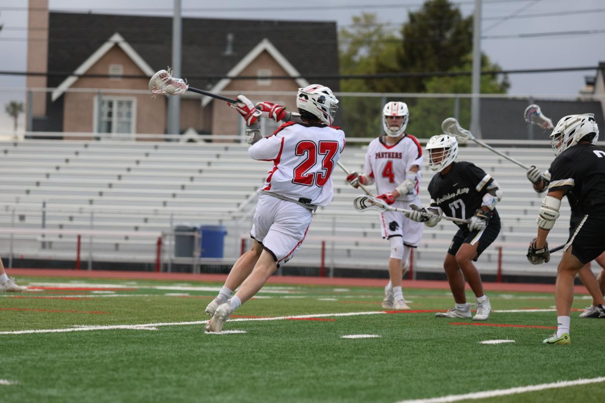Senior midfielder Henry Bradley winds up for a shot during the third quarter of the Panthers’ CCS matchup against Archbishop Mitty.