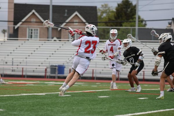 Senior midfielder Henry Bradley winds up for a shot during the third quarter of the Panthers’ CCS matchup against Archbishop Mitty.