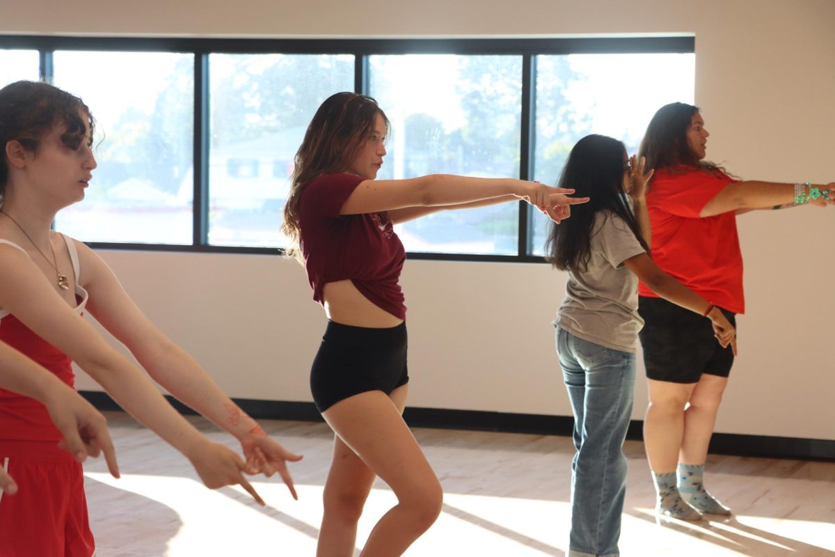 The dance team meets for mandatory practice on Wednesday, Aug. 27, preparing for their performance at the “Welcome Back” rally.
