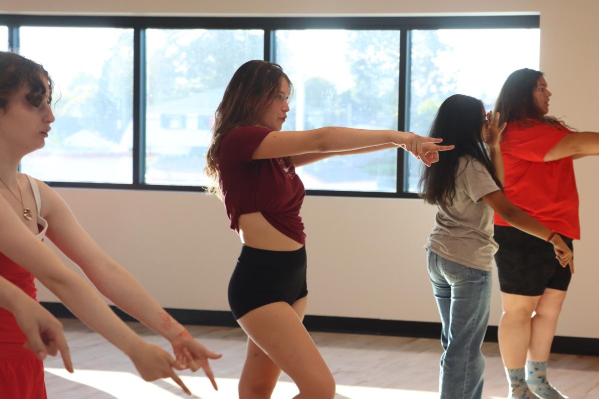 The dance team meets for mandatory practice on Wednesday, Aug. 27, preparing for their performance at the “Welcome Back” rally.