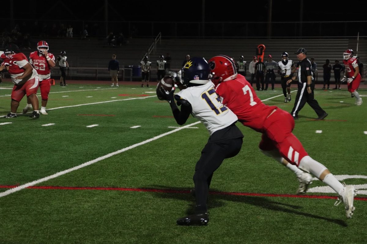 Junior Dylan Black breaks up a pass against a King’s Academy receiver.