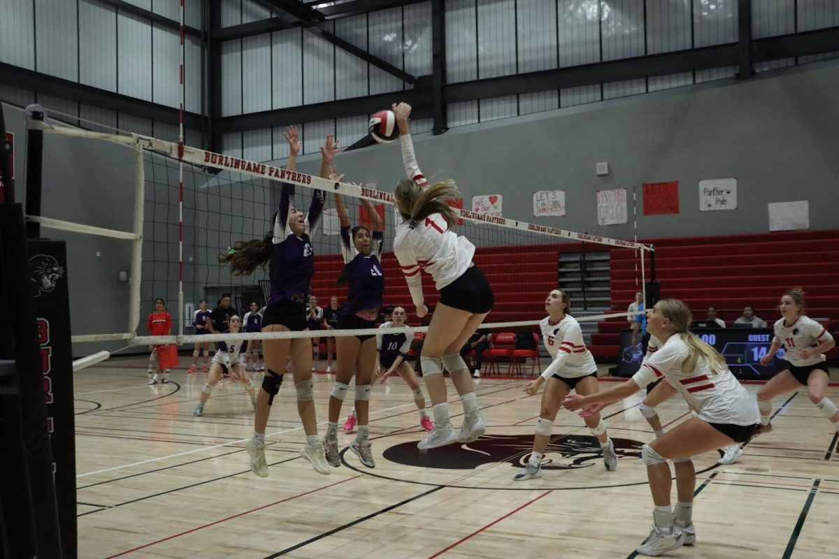 Junior outside hitter Jordan Toomey hits the ball for a kill against Sequoia High School in their match on Tuesday, Oct. 7.