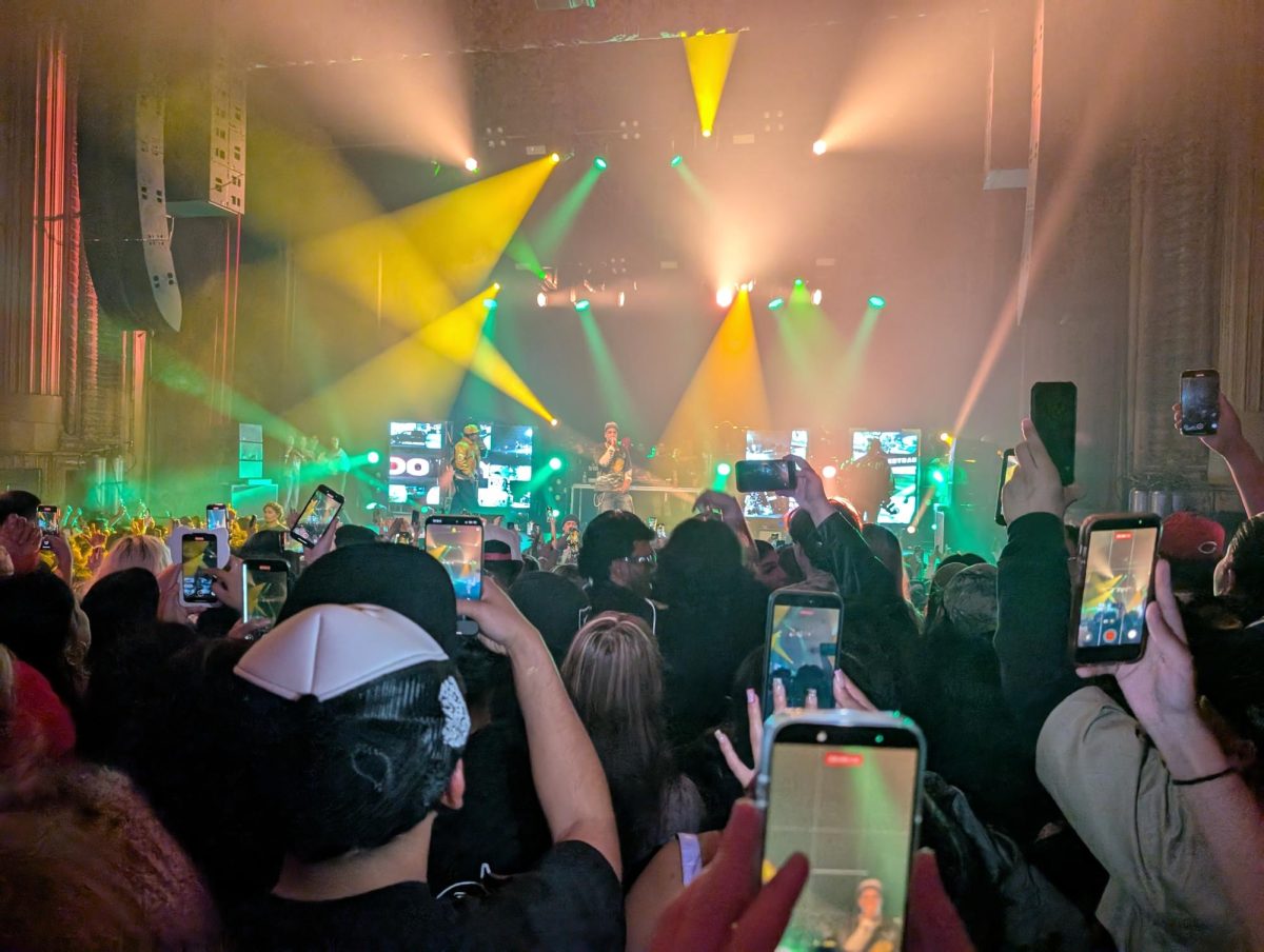 Group members Fenix Flexin and OhGeesy take the stage.