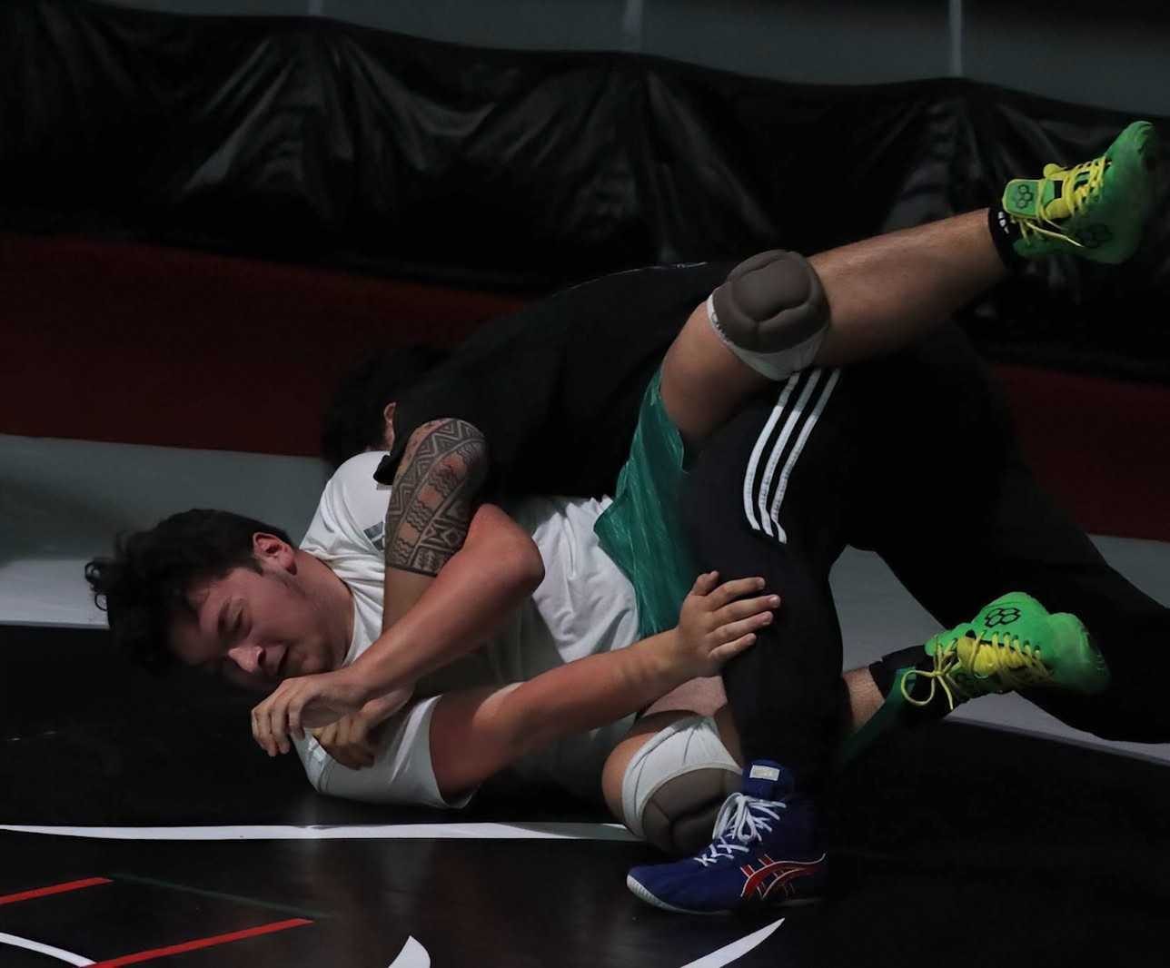 Wrestlers run matches at the end of practice on Nov. 15.