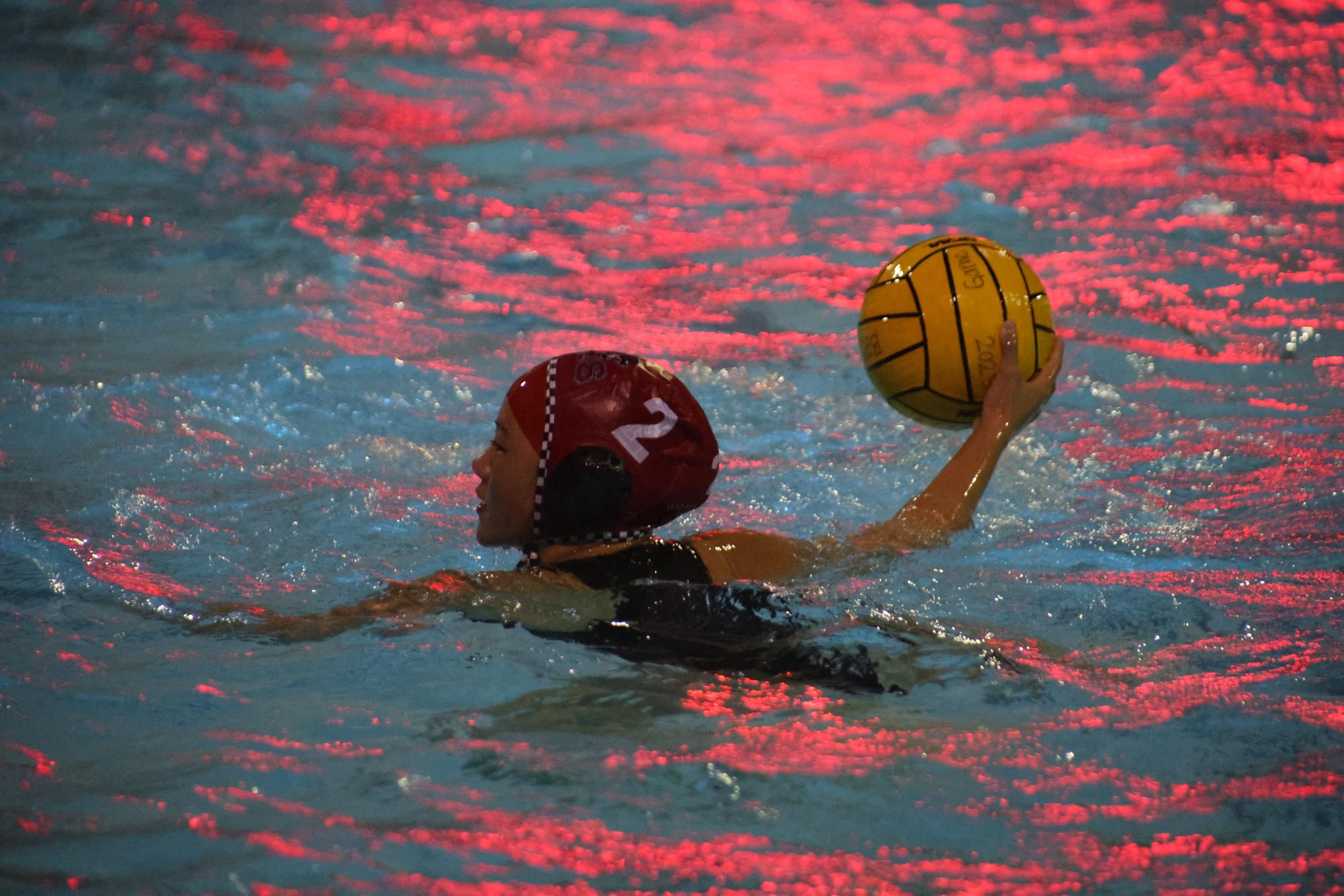 Senior Marina Chan gets ready to set up one of her teammates to score.