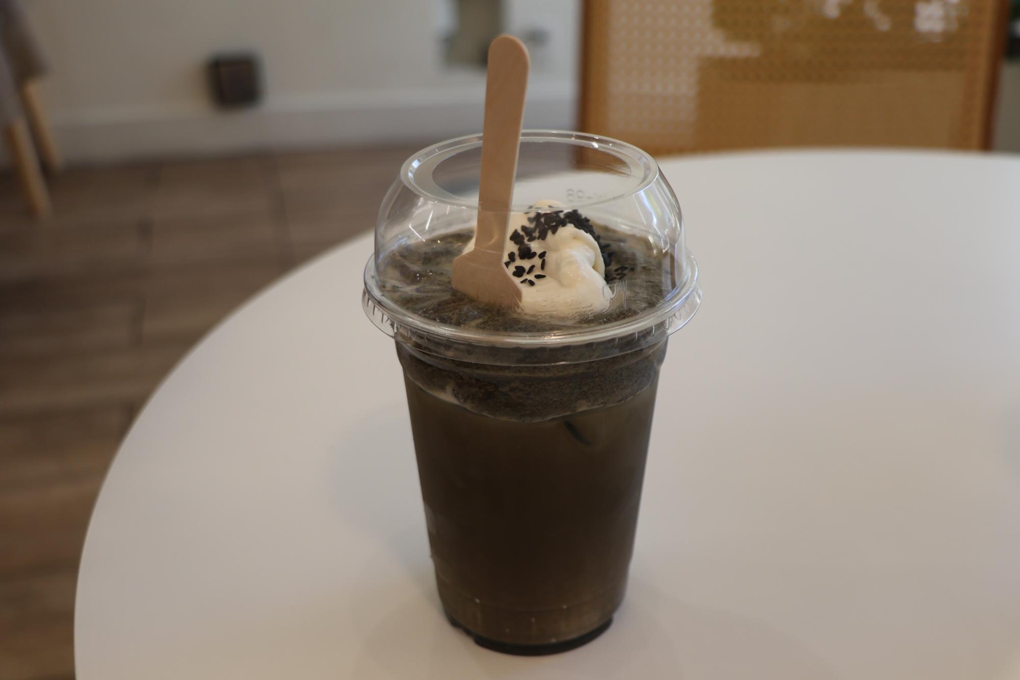The Black Sesame Hojīcha Einspänner was a unique approach to the traditional einspänner, blending flavors like hojīcha and black sesame to make a balanced and not overly sweet drink.