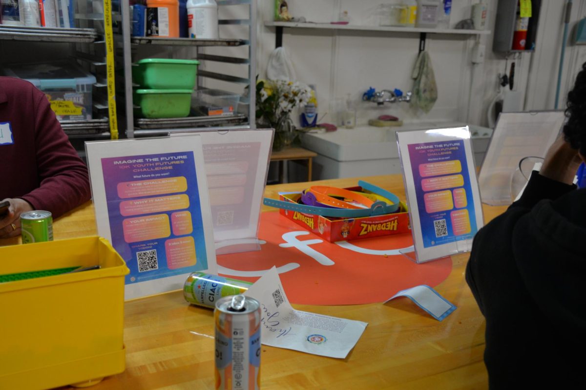 Each table had signs with descriptions of the organizations and their QR code. At one of the tables, people could play various board games.