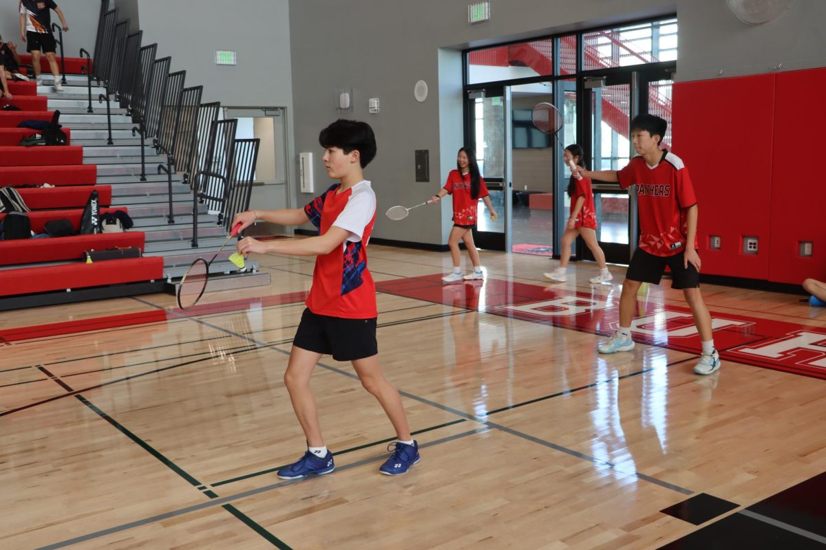 Junior Jonathan Friedman and sophomore Justin Sun compete in boys No. 2 Doubles match up.