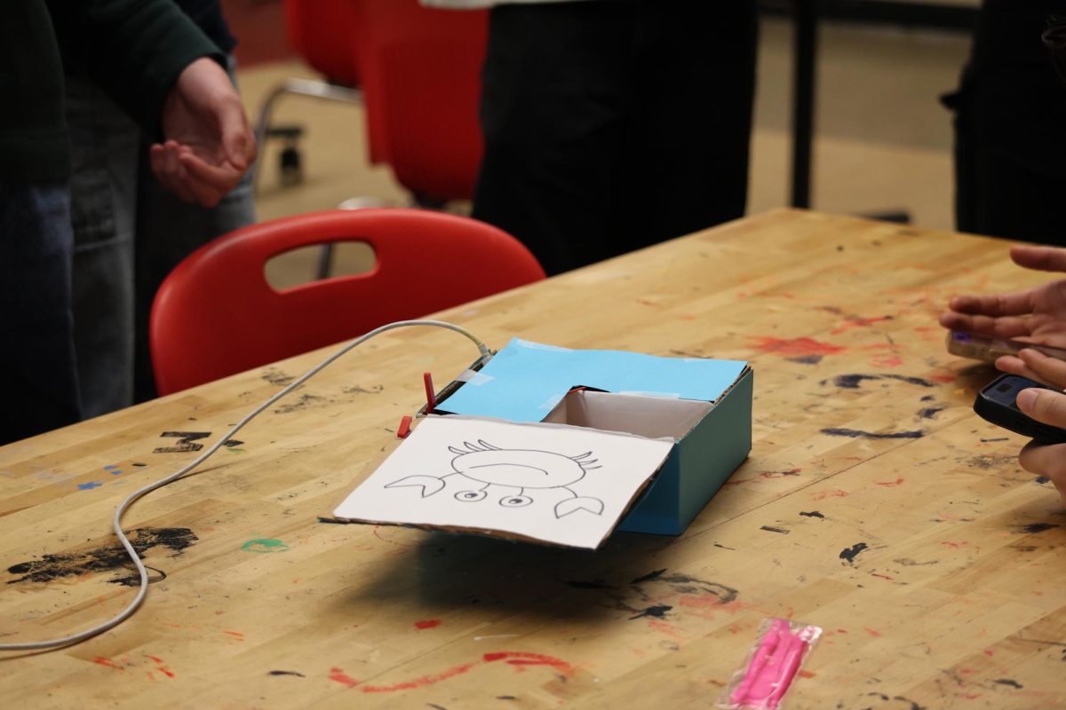 The final challenge of the winning Panther Hacks project featured a device connected to the team’s software app that opens to reveal a surprise.