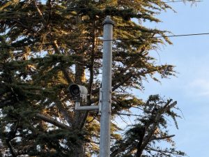 A Flock safety camera watches the Broadway and El Camino intersection for outgoing traffic. Across Burlingame’s 17 cameras, over 30,000 photos are taken per day.