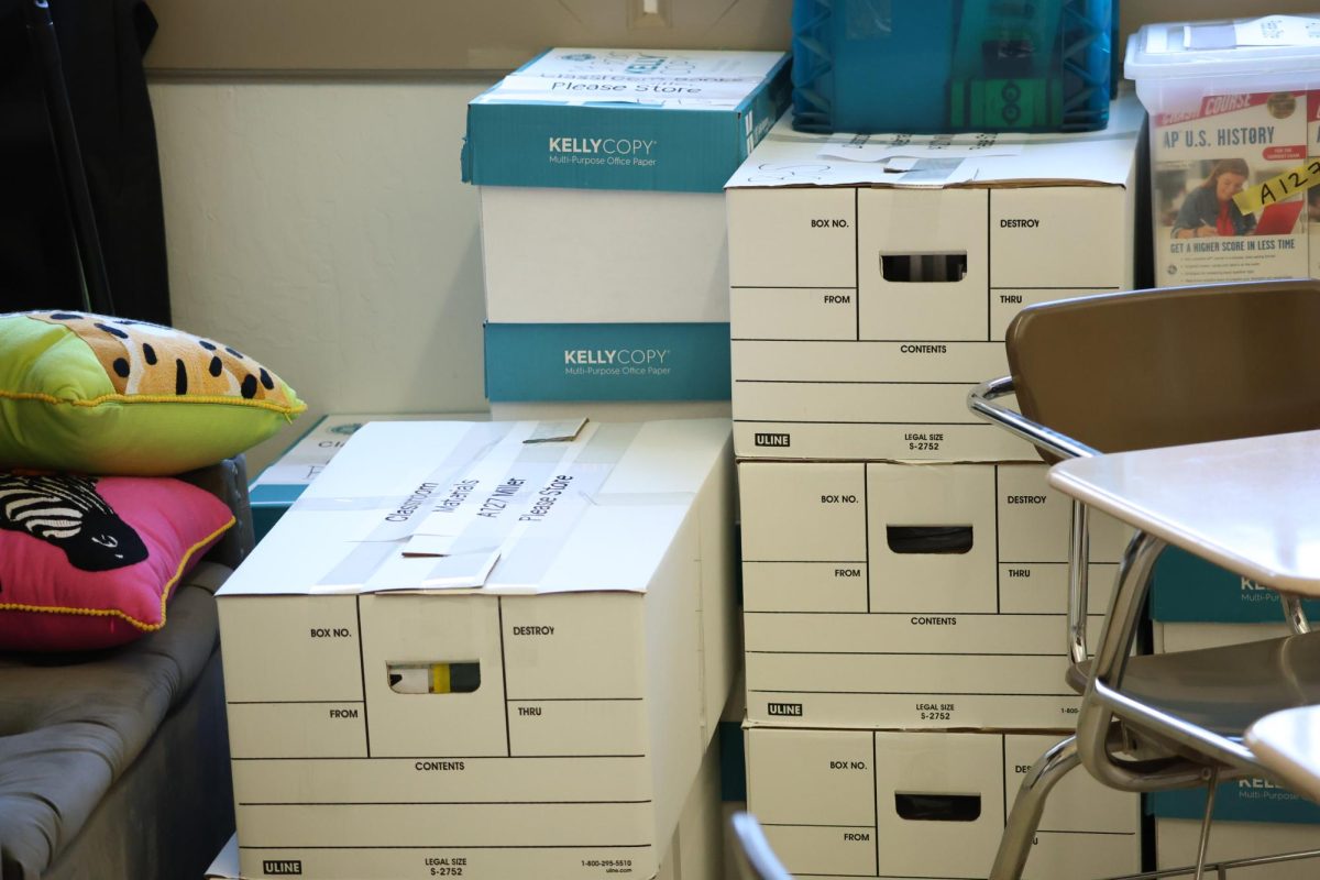 History teacher Annie Miller has been working on packing up her classroom all semester with help from her teacher’s assistant, senior Avery Speight.
