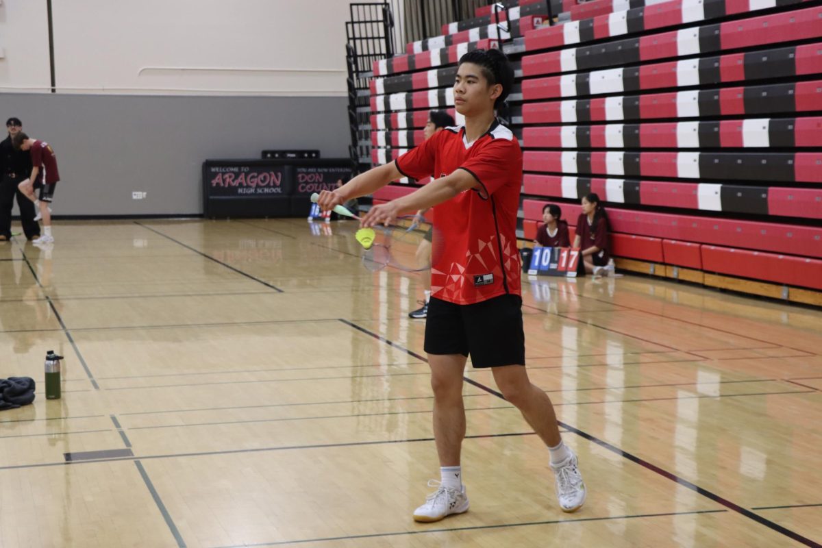 No. 1 boys’ singles player, sophomore Alvin Ho, serves the ball.